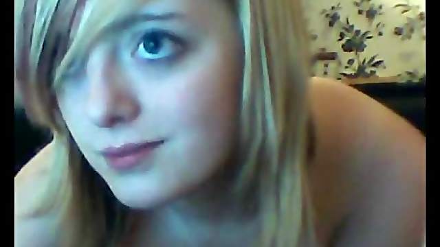 Pretty blonde amateur teen flashes her tits for the webcam