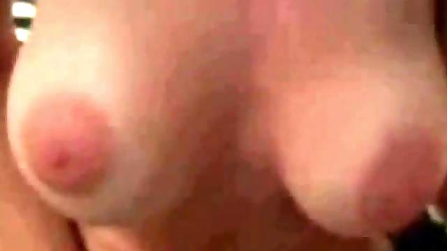 Blonde camgirl with fake tits masturbates