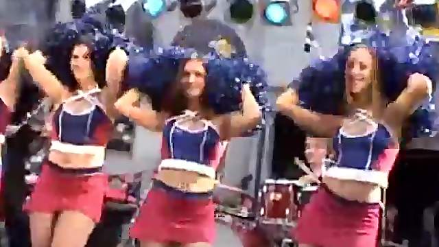 Cheerleaders in short skirts on stage at show