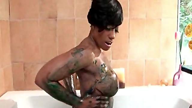 Cherokee Dass cleans her body in bathtub