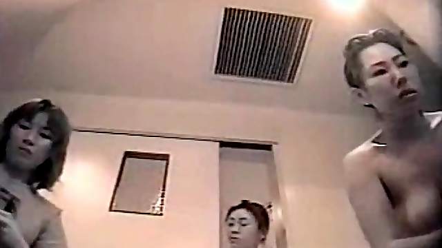Freshly showered Asian amateurs dry off in voyeur video