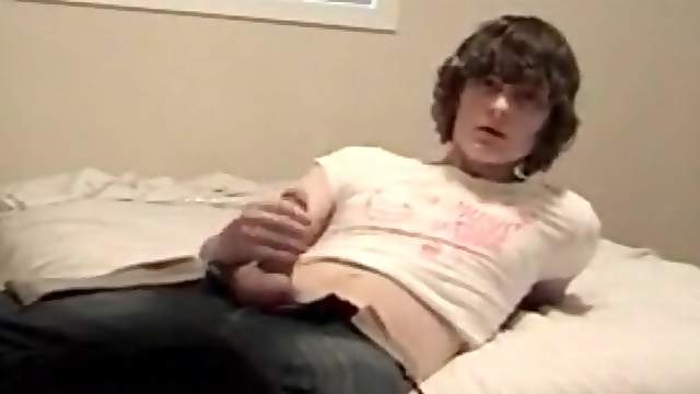 Twink in jeans plays with his cock
