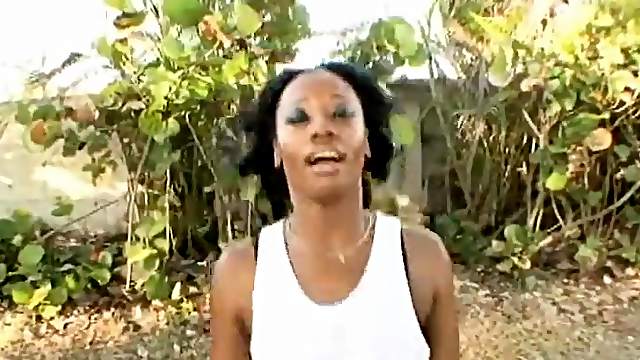 Curvy black girl does jumping jacks outdoors