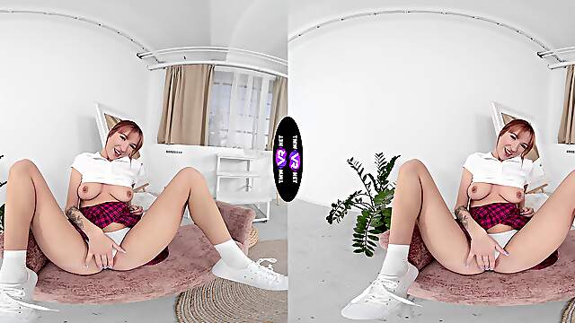 Redheaded Lilly in a tight miniskirt and thong gets her sweet spot fingered while wearing sneakers